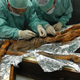 Scientists taking samples from the Iceman’s stomach.